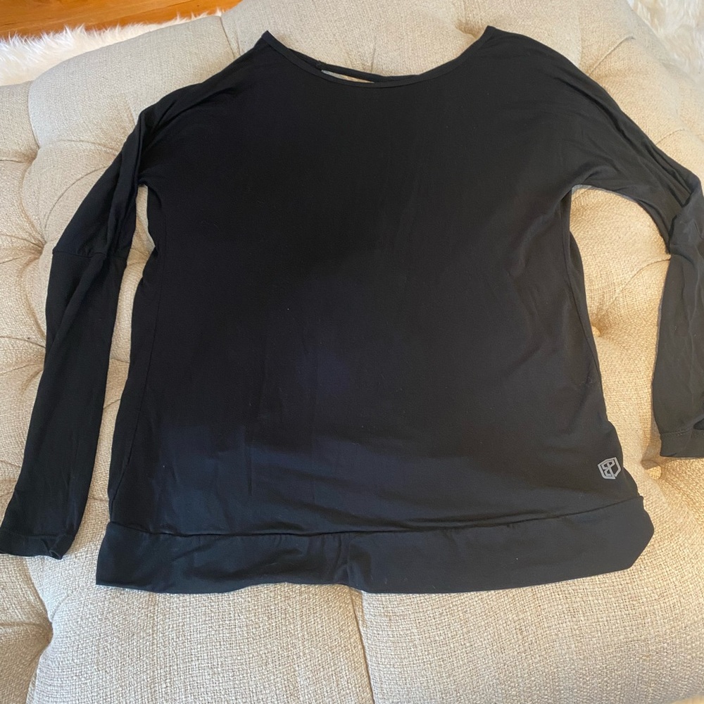 Black born primitive long sleeved open back top, size small